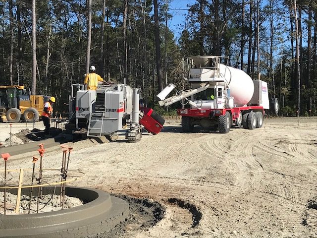 concrete truck supplying curber